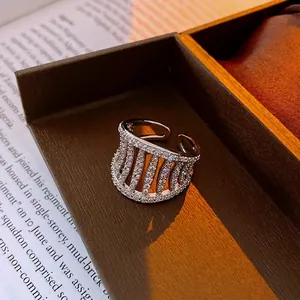 Luxurious silver hollowed-out wide ring with micro-set zircon and adjustable open design
