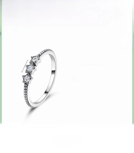 Detailed view of S925 sterling silver star ring with round bead texture and cubic zirconia