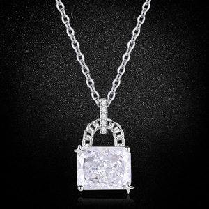 Close-up of ice flower cut pink sapphire pendant on a silver necklace chain