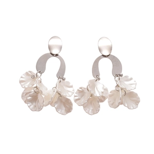 Silver drop earrings with tiered white acrylic flower petals and sparkly diamond accents