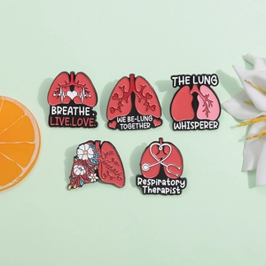 Five unique respiratory therapist enamel pins featuring lungs and floral medical motifs