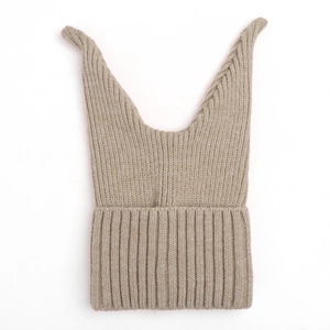 Close-up of soft ribbed knit texture on khaki winter beanie for kids with ear flaps