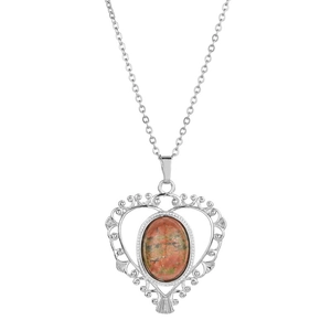 Collier cœur argenté avec pierre précieuse brun-rouge et design ajouré rétro