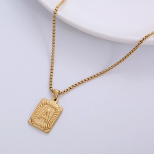 18k gold plated stainless steel necklace featuring a diamond cut rectangular letter A pendant