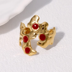Irregular 18k gold plated stainless steel ring with red enamel dots in lava style