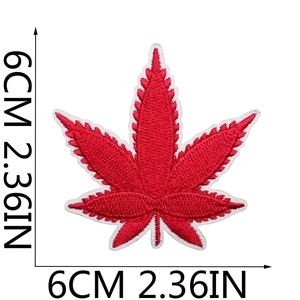 Detailed macro view of red maple leaf embroidery patch with 6cm size measurement marks