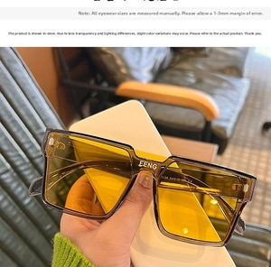 Detailed close-up showing the FENG logo and frame specifications on yellow square sunglasses
