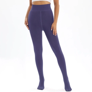 Macro detail of high-waist lilac thermal leggings with elastic tummy control waistband