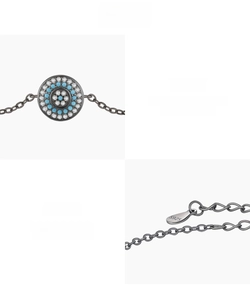 Detail view of S925 sterling silver stamp and synthetic turquoise on vintage bracelet
