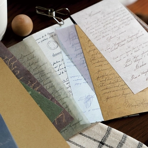 Vintage scrapbooking paper collection with handwritten prints and mixed textures