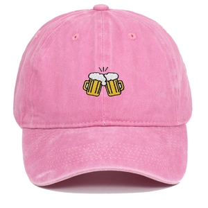 Close-up of pink washed cotton baseball cap with beer mugs embroidery detail