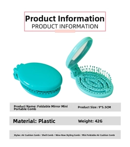Detail view of foldable mint green hairbrush with mirror and compact 9x5.5cm size