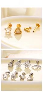 Détail de piercings labret en titane avec zircons en forme d'étoile et flocon, or et argent