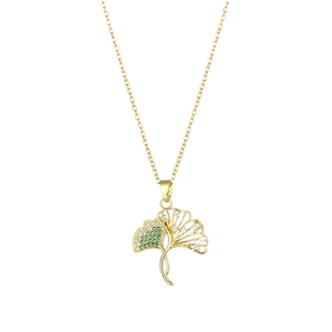 Elegant gold ginkgo leaf necklace with green and clear zircon stones on a white background
