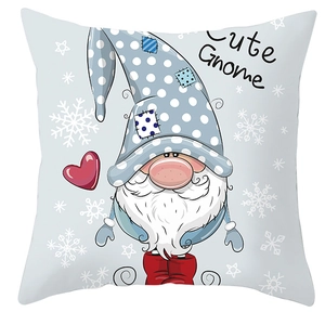Detail view of gnome pillowcase with blue polka dots and a red heart snowflake design
