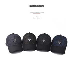 Detailed view of classic baseball caps in four colors with embroidered geometric logo