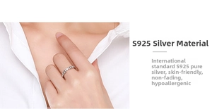 Detail view of a 925 sterling silver ring with white zircon on a model's finger