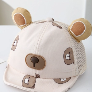 Close-up of baby mesh sun hat with 3D bear ears and breathable knit fabric texture