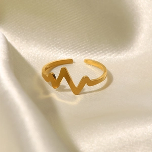 French style 18K gold plated heart rate wave open ring on soft beige silk fabric