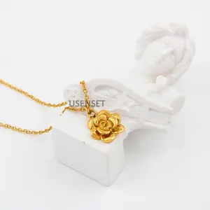Exquisite 18K gold plated stainless steel lotus pendant necklace displayed on a white bust