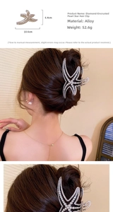 Detail of starfish hair claw clip with pearls and rhinestones showing size and wear effect