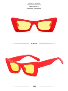 Detail of red geometric cat-eye sunglasses with translucent yellow lenses in color C5