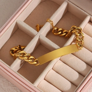 Polished 18K gold plated Cuban chain bracelet with ID plate in pink jewelry box