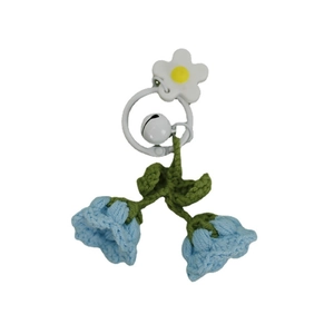 Handmade crochet Lily of the Valley keychain with blue yarn flowers and white bell charm