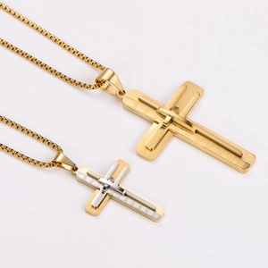 Vintage style gold and silver dual-tone cross pendant necklaces on white background
