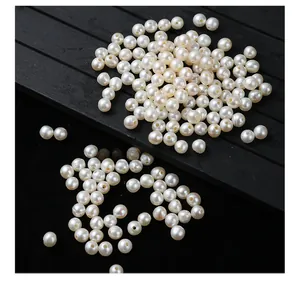 Macro detail of 4-5mm natural freshwater pearls with large holes for DIY jewelry making