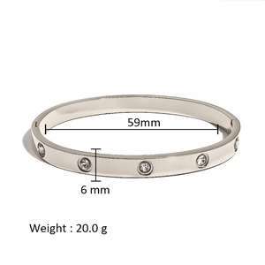 Detailed size specifications for silver stainless steel bangle showing 59mm diameter and 6mm width