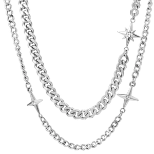 Layered silver starburst necklace with cubic zirconia pendant on polished Cuban link chain