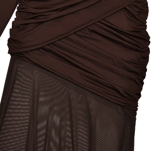Detail of dark brown sheer mesh stitching and ruched texture on slim fit dress