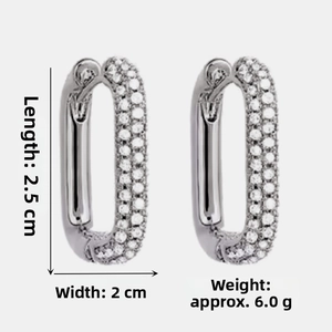 Detail view of rectangular silver hoop earrings with size 2.5cm by 2.0cm and weight specs