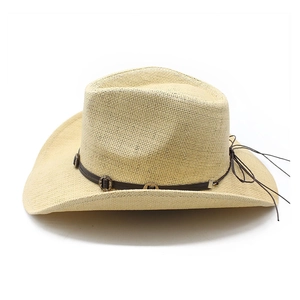 Detailed view of wide-brim straw jazz hat with brown leather band and metal ring
