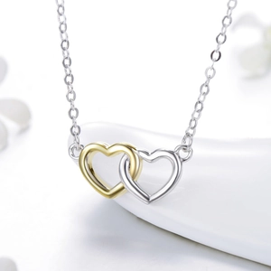 Élégant collier cœurs entrelacés en argent S925 avec finition bicolore or et argent brillant
