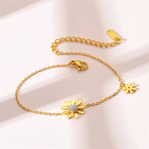 Elegant gold titanium steel daisy bracelet with sparkling crystals and adjustable chain