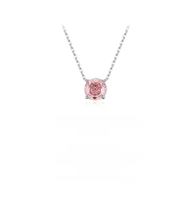 Detailed macro view of the rose-cut pink gemstone pendant on a S925 silver chain
