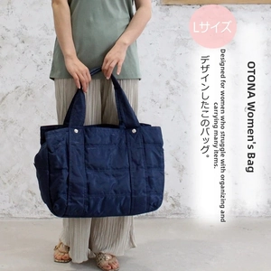 Large quilted nylon tote bag in navy blue with wide handles and spacious interior