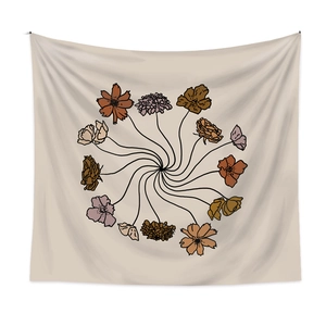 Detail of vintage floral wreath tapestry in beige fabric for bohemian home wall decoration