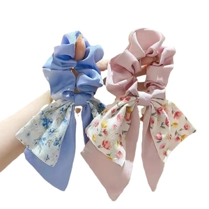 Floral bow scrunchies in blue and pink chiffon fabric for women hair styling