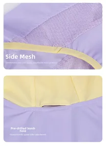 Détail du gilet respirant violet pour chien avec bordure jaune et trou de laisse