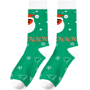 Detail of Christmas crew socks with green knit base and Santa Claus pattern