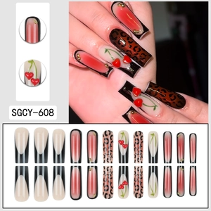 Long coffin press-on nails with leopard print, French tips, and 3D cherry heart design