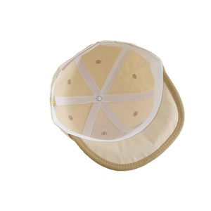 Inside view of baby soft brim cotton cap in khaki with reinforced seams and smile tag