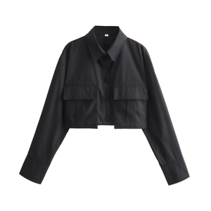 Flat lay of black cropped utility shirt with large chest pockets and lapel collar