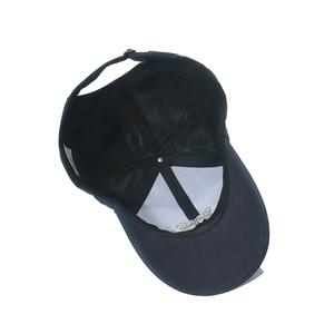 Inside view of sun baseball cap with sweatband, support lining and butterfly embroidery