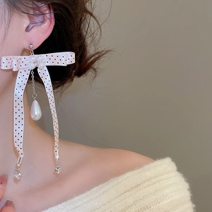 Pink polka dot ribbon bow earrings with teardrop pearls and sparkly zircon accents