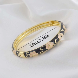 Detail shot of vintage cloisonne floral enamel bangle showing 6.0cm diameter measurements