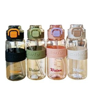 Set of four minimalist plastic sports water bottles with straws and silicone sleeves